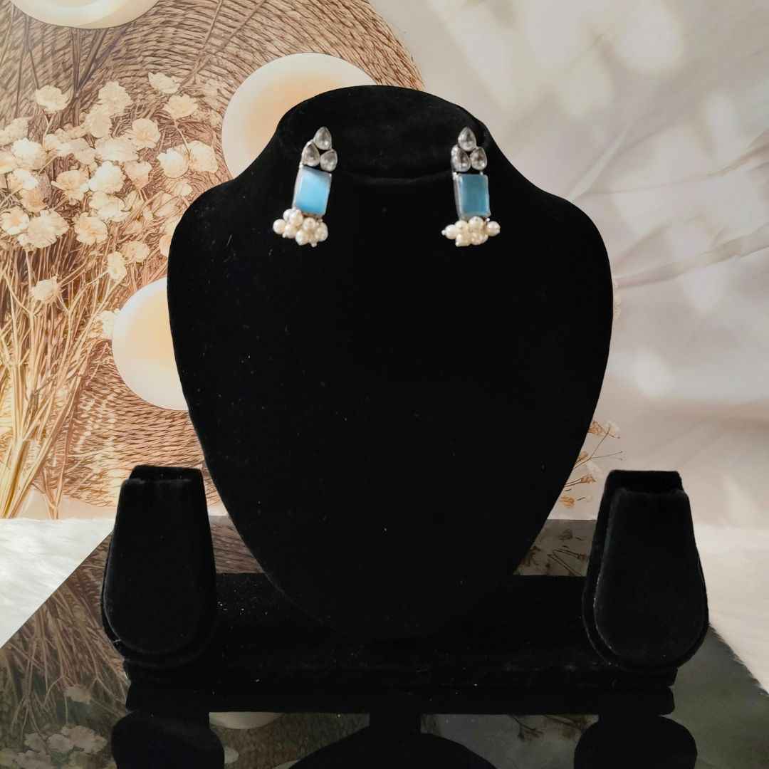 Elegant Silver-Toned Stud Earrings with Blue Stone and Pearls